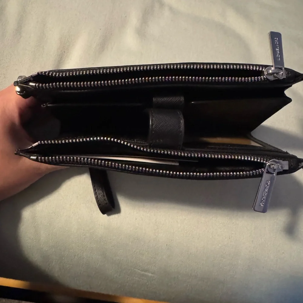 NWOT defect Michael Kors Black Wristlet